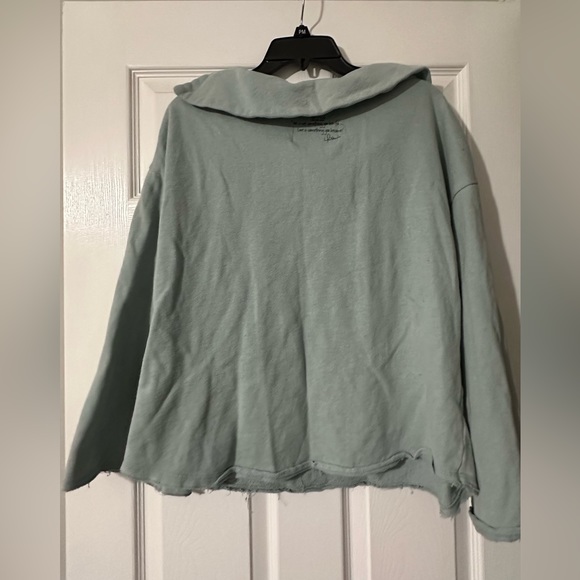 Peace Love World sweater is a size Medium. - Picture 2 of 7